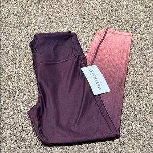 Athleta women’s Gradient Leggings in burgundy and Pink
